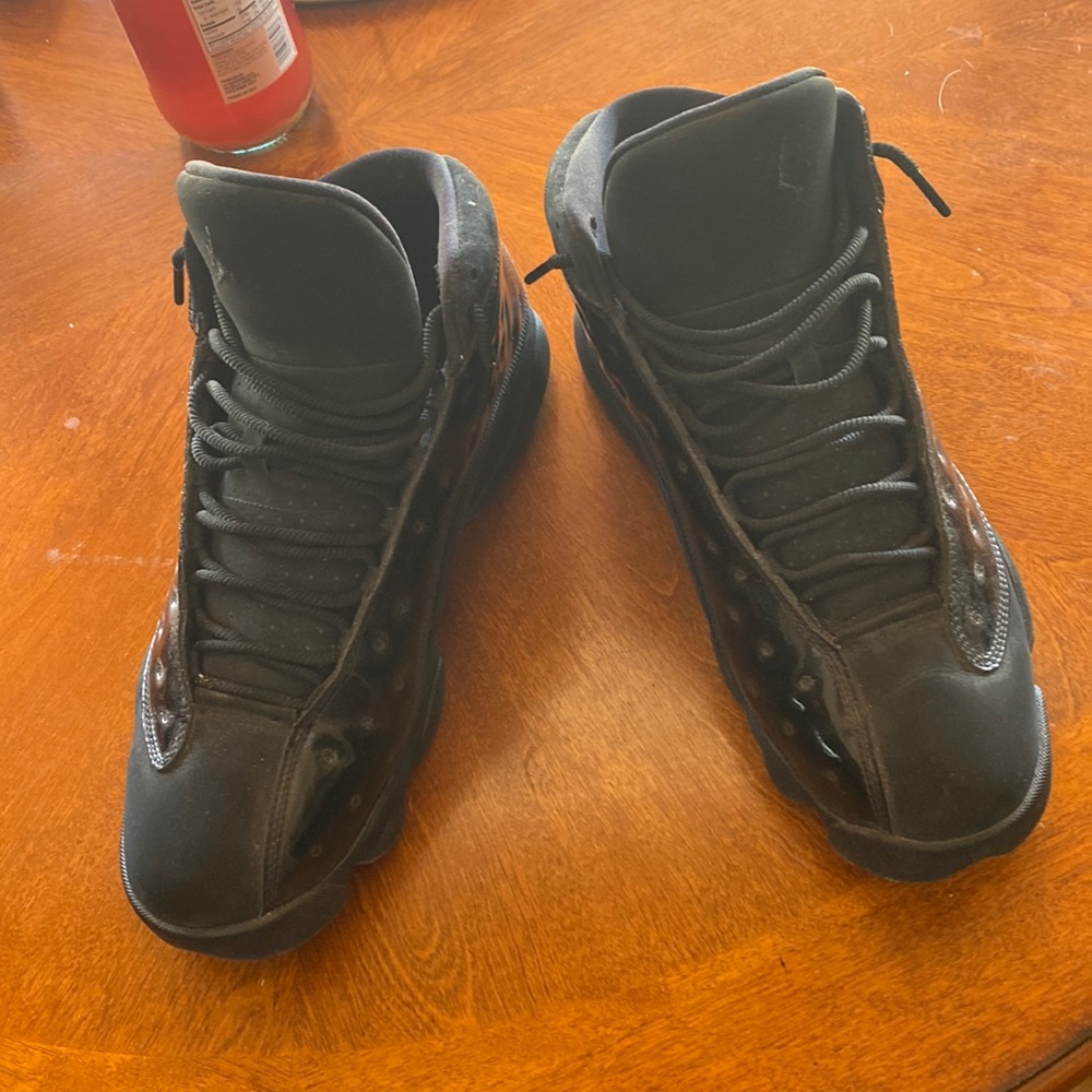 Black air Jordan 13s